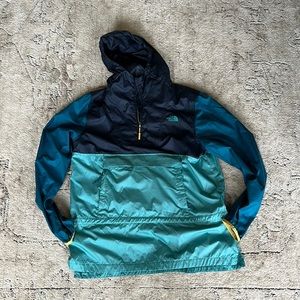 North Face wind breaker. Folds into a fanny pack, perfect for hiking!
